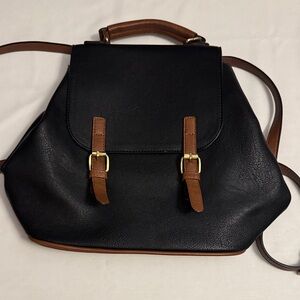 Chic Black Leather Backpack with Brown Accents